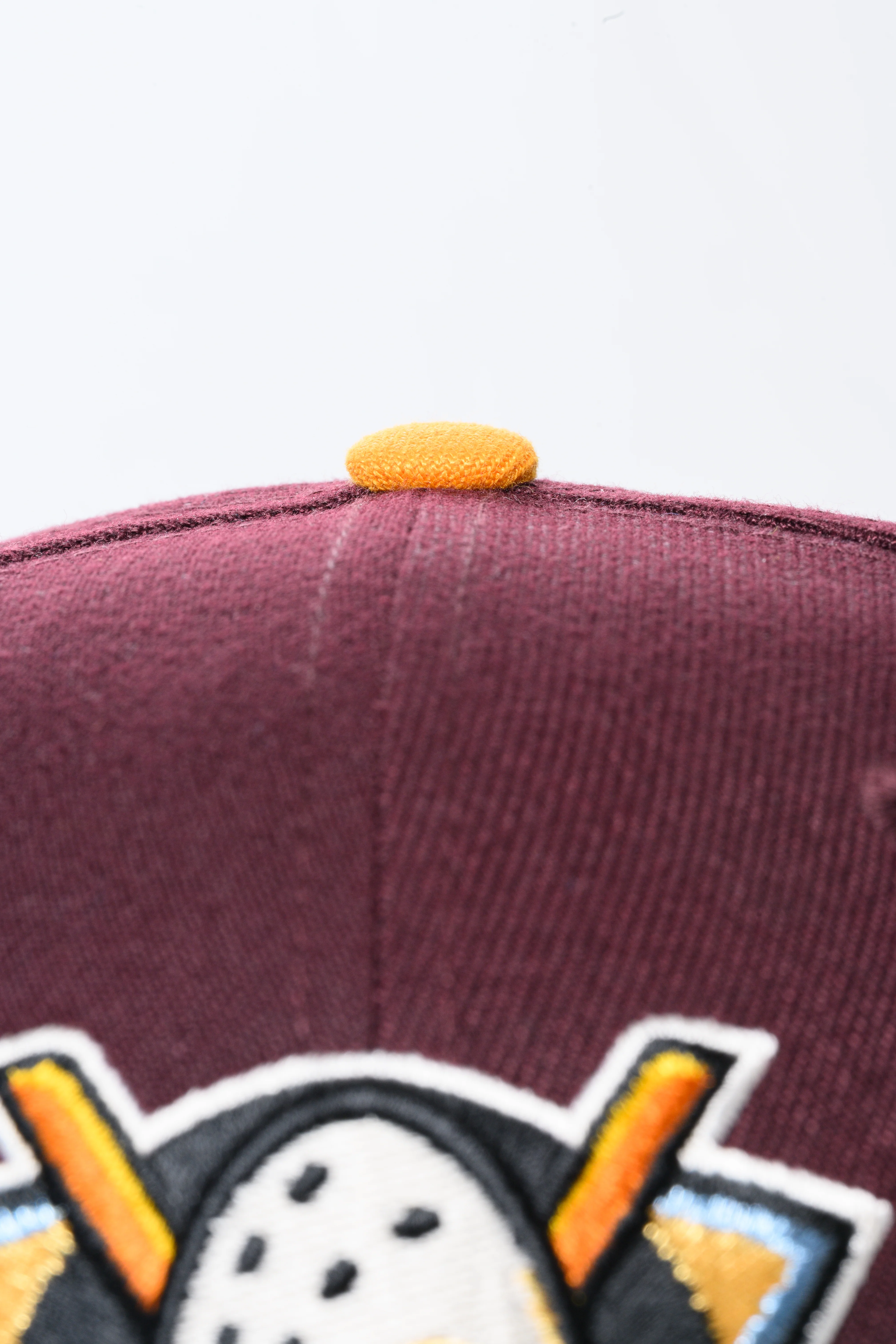 NEW ERA "KNUCKLE PUCK" ANAHEIM DUCKS FITTED HAT (MAROON/TEAL/GOLD) - Image 4