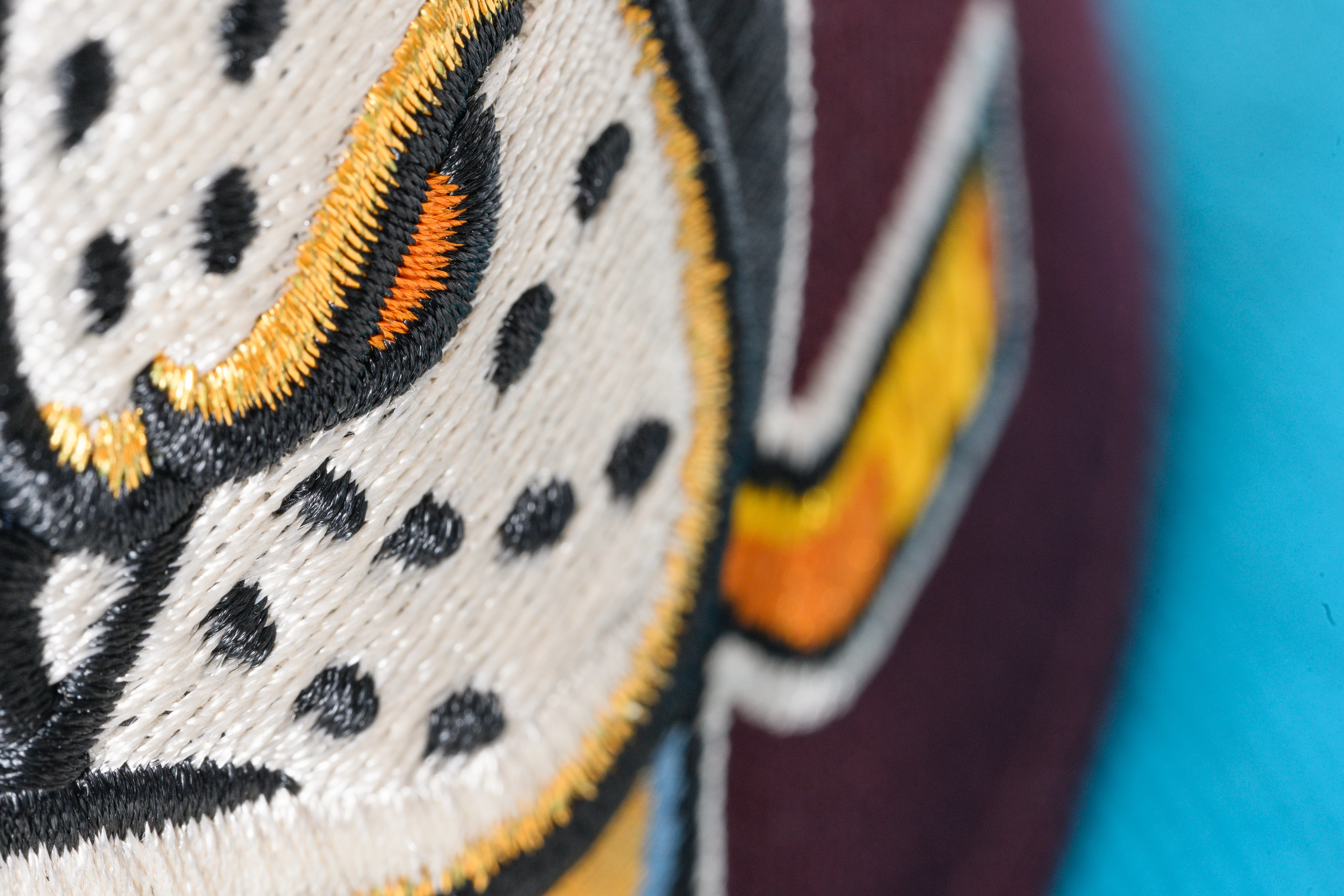 NEW ERA "KNUCKLE PUCK" ANAHEIM DUCKS FITTED HAT (MAROON/TEAL/GOLD) - Image 5