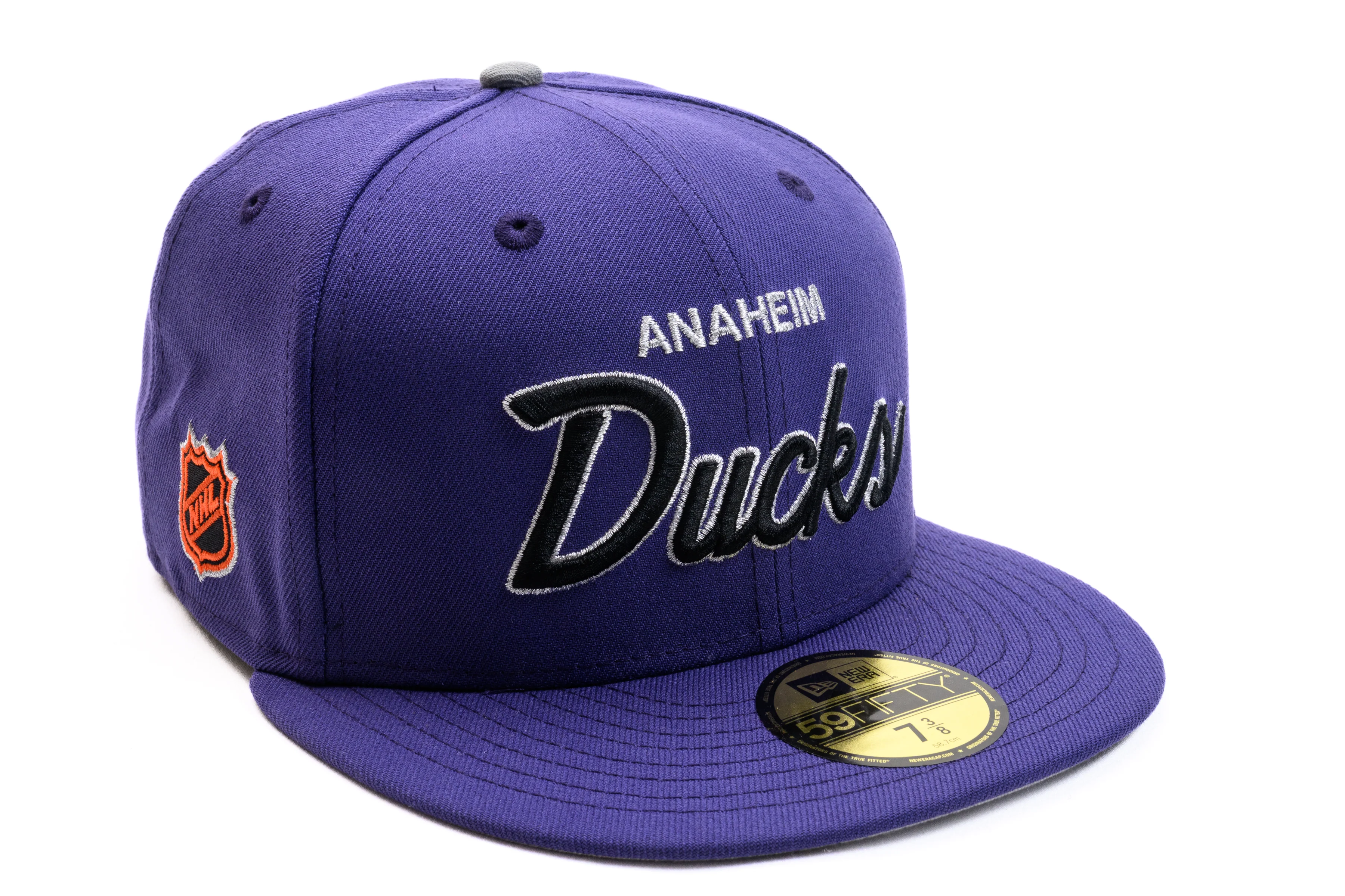 NEW ERA "RETRO SCRIPT" ANAHEIM DUCKS FITTED HAT (PURPLE/GREY)