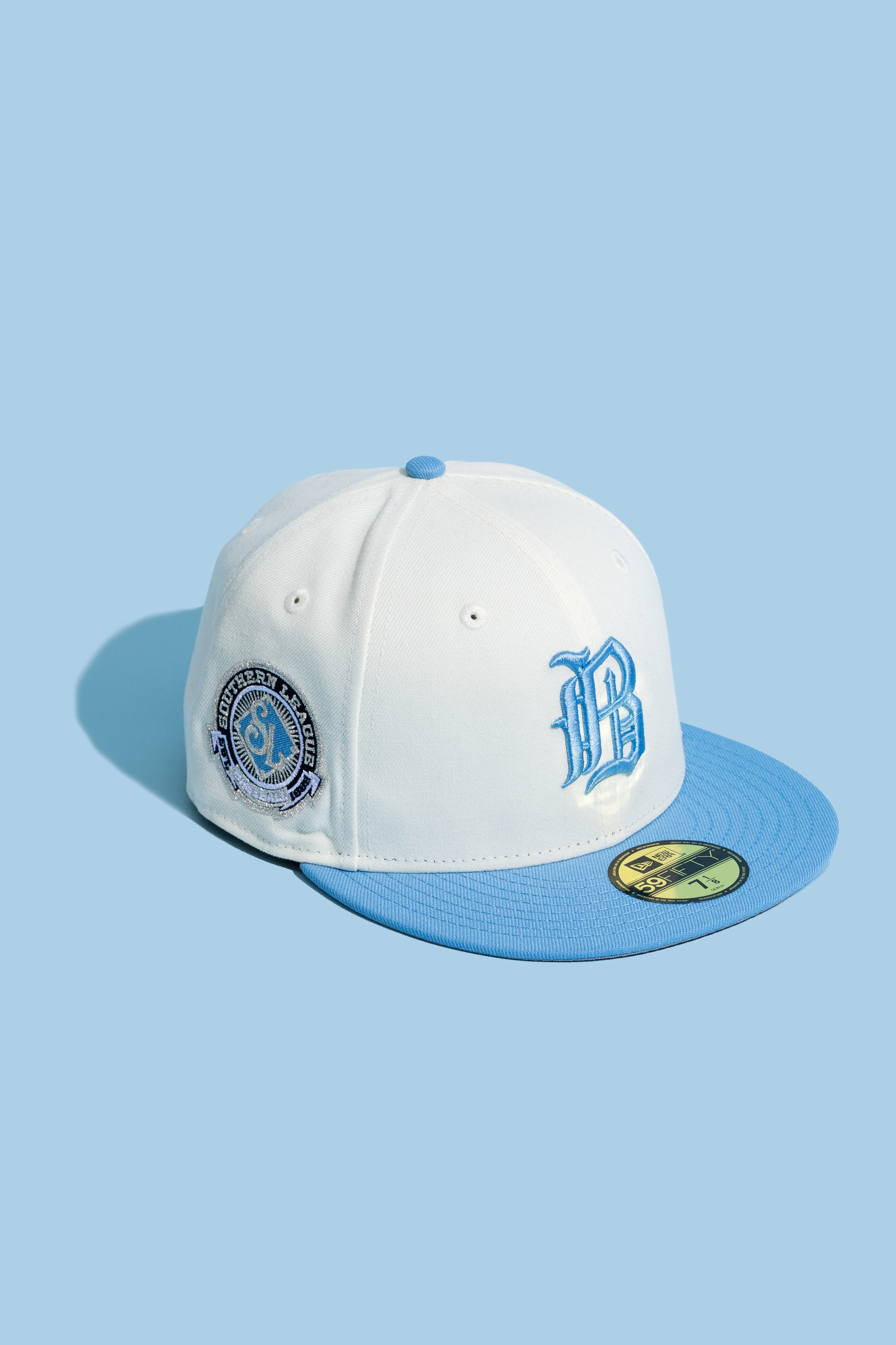 NEW ERA “THE SHOT 2.0" BIRMINGHAM BARONS FITTED HAT (CHROME WHITE/LIGHT BLUE)